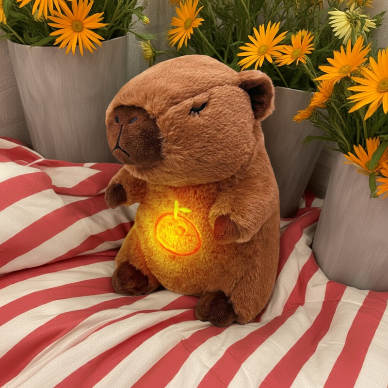 Capivara de pelúcia com som e luz, recheado com abraço!