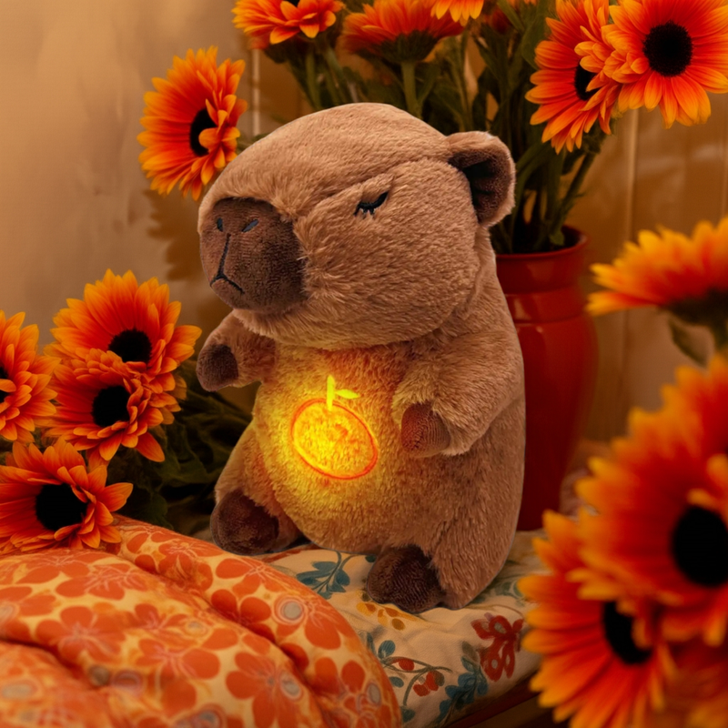 Capivara de pelúcia com som e luz, recheado com abraço!